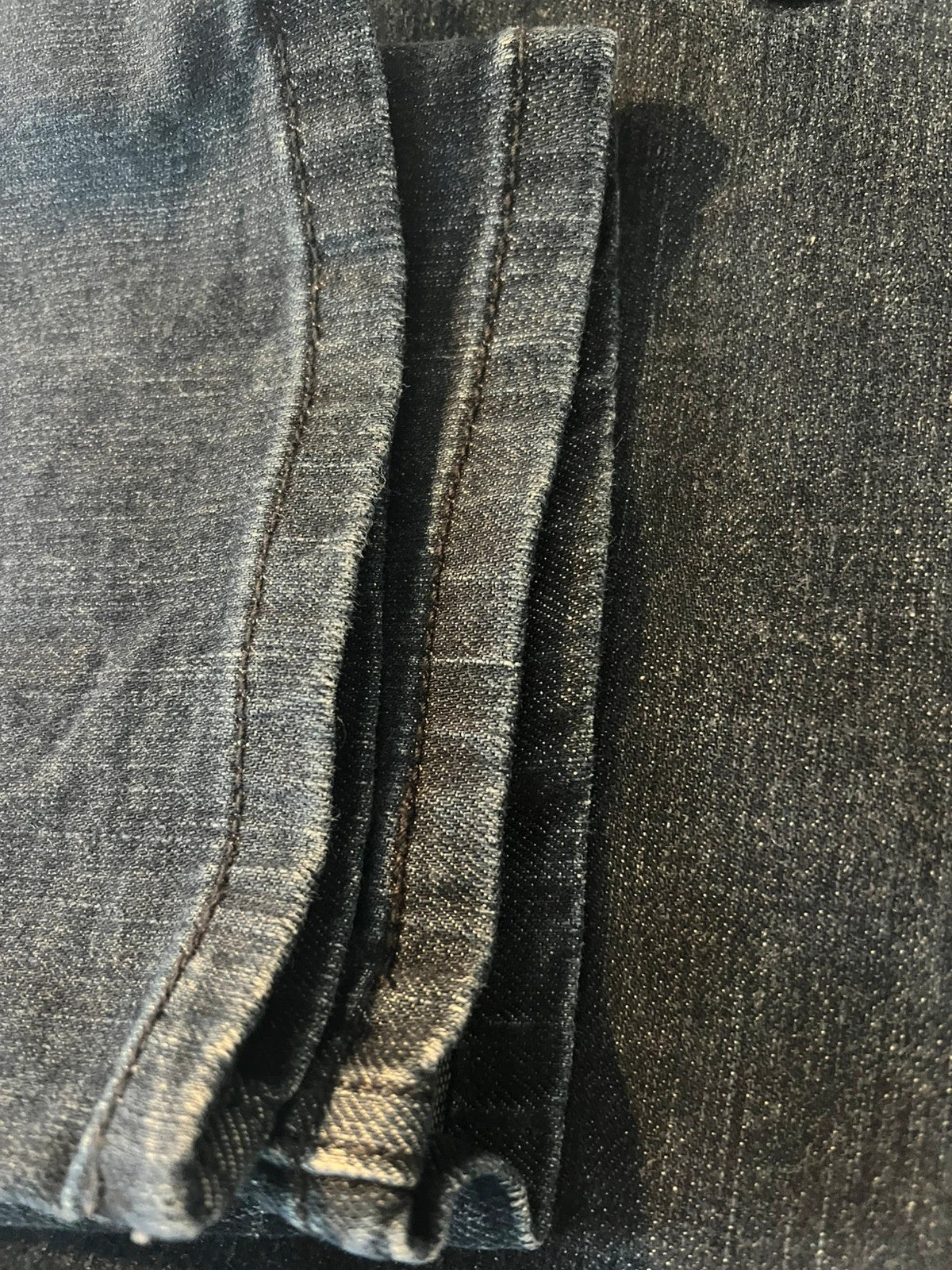 Levi's navy straight jeans with classic 505 logo and denim material.