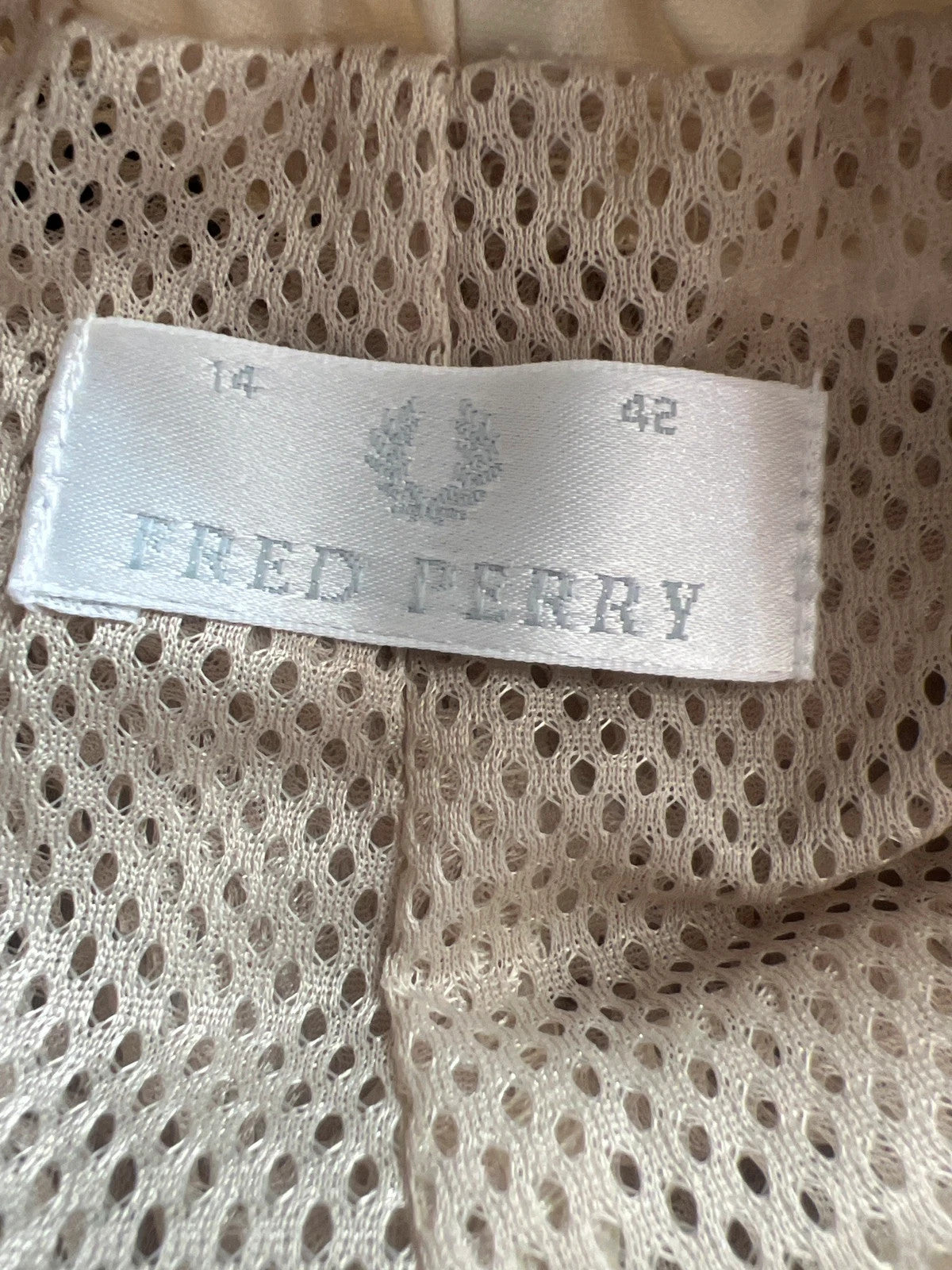 Fred Perry beige wide-leg trousers 100% nylon with logo detail.