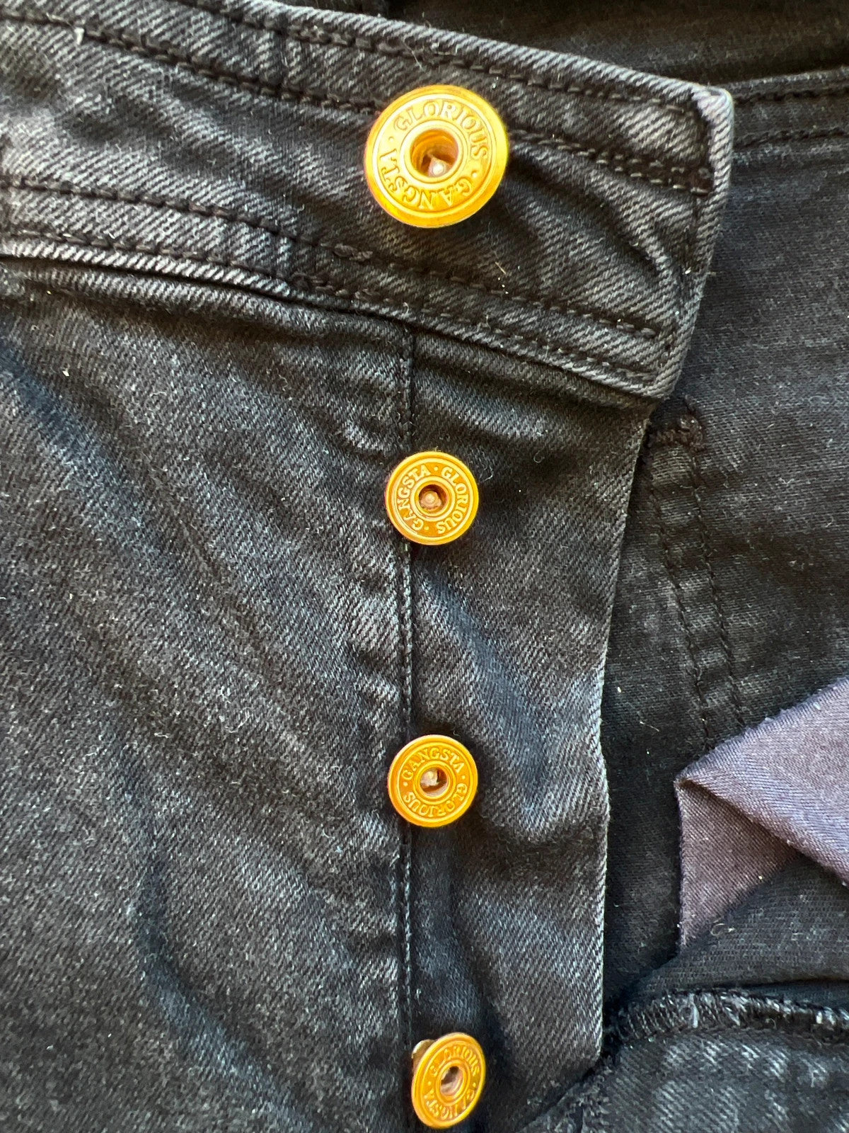 Glorious Gangsta black biker jeans with distressed knee panels and slim fit.