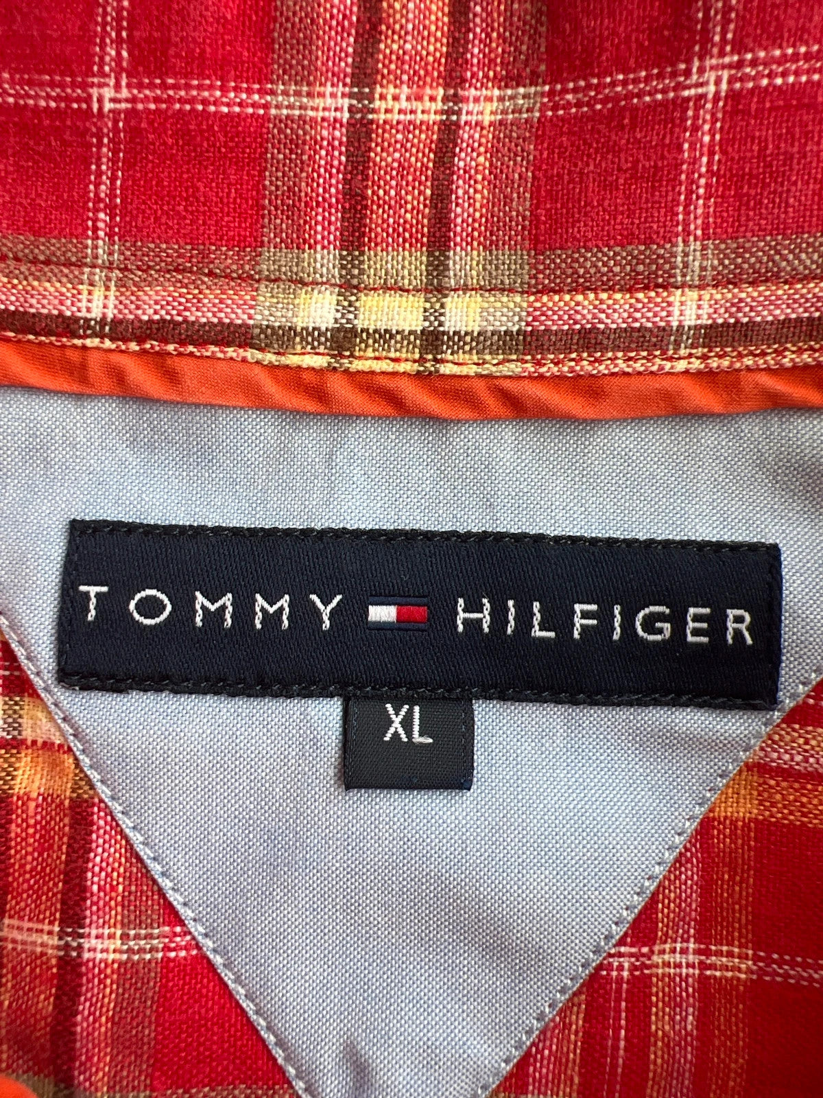 Tommy Hilfiger red short-sleeve button-down shirt with checkered pattern and linen material.