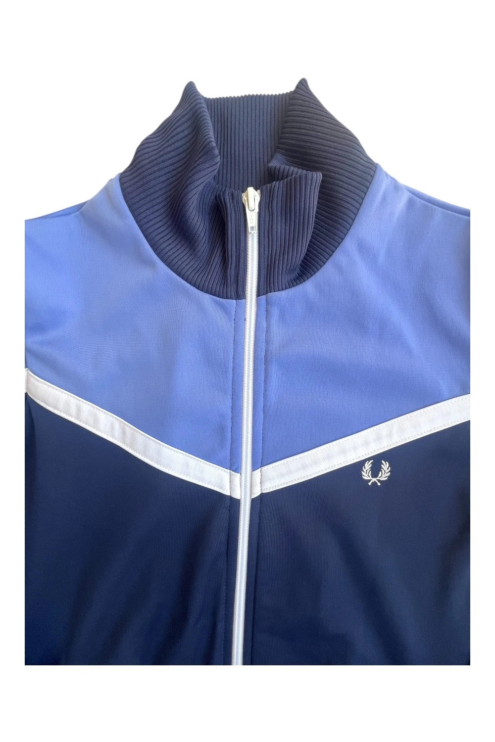 Fred Perry blue Y2K sporty jacket with logo detail and vintage track design.