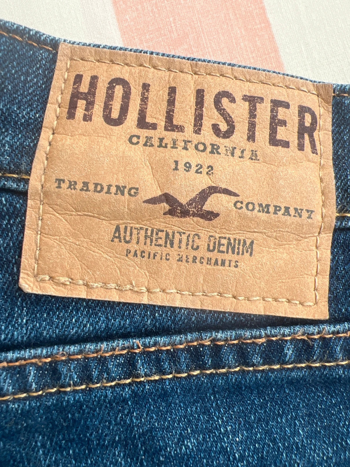 Hollister navy straight jeans slim fit casual style with modern cut.