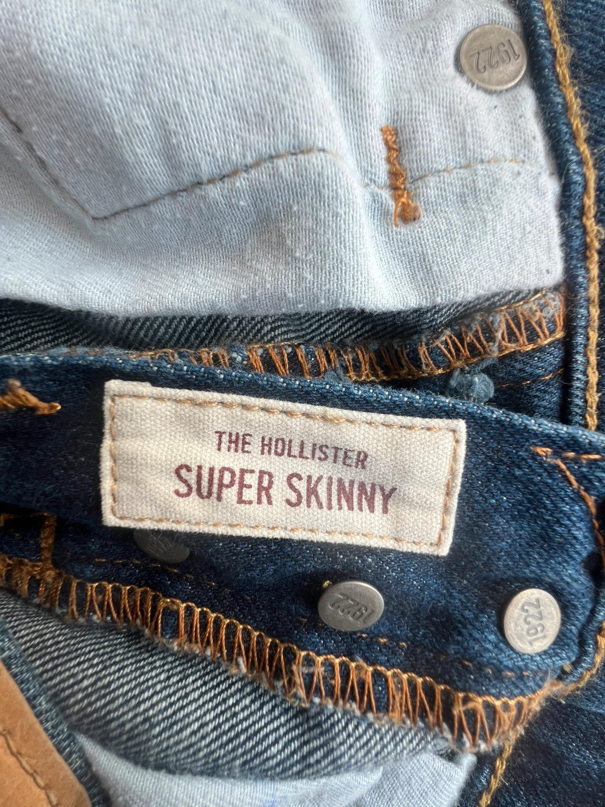 Hollister navy straight jeans slim fit casual style with modern cut.