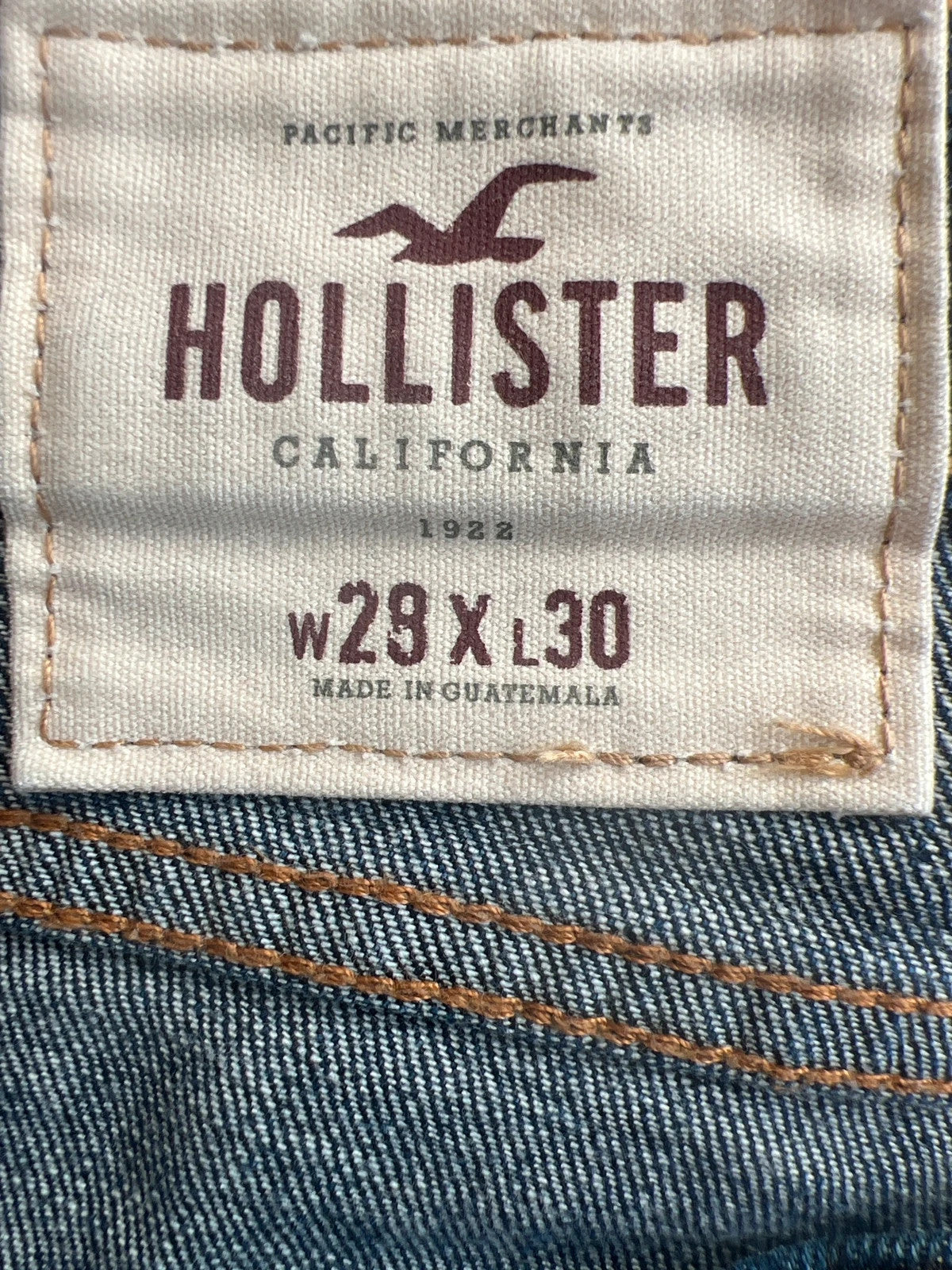Hollister navy straight jeans slim fit casual style with modern cut.
