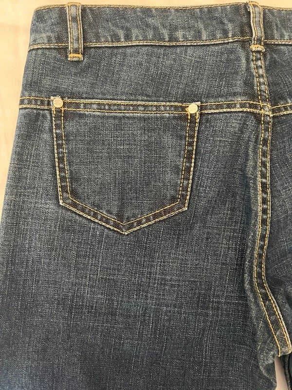 Burberry navy straight jeans with interior check pattern, slightly fitted, 100% cotton.