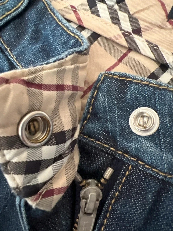Burberry navy straight jeans with interior check pattern, slightly fitted, 100% cotton.