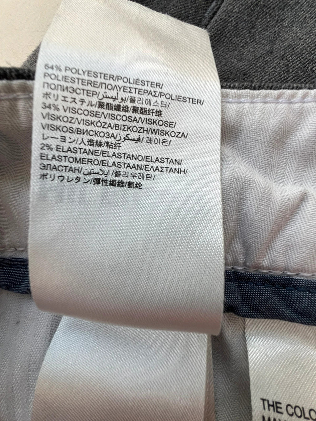 Tommy Hilfiger grey chino trousers with logo tag and soft fabric blend.
