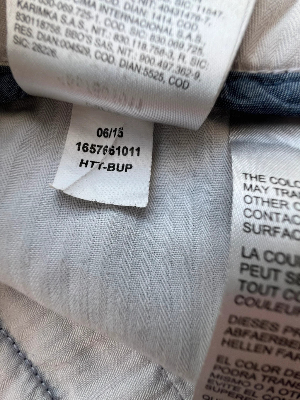 Tommy Hilfiger grey chino trousers with logo tag and soft fabric blend.