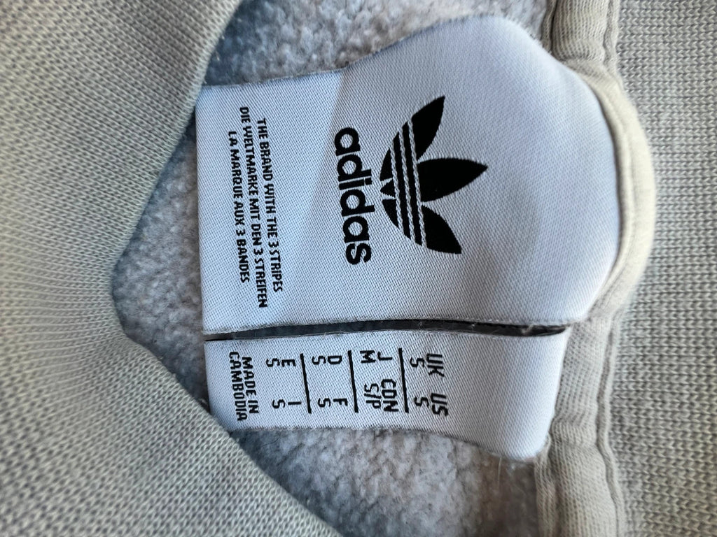 Adidas vintage grey and green crewneck sweatshirt with casual sport style and slight pilling.