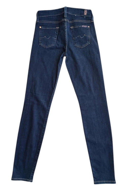7 For All Mankind navy skinny jeans with elastic denim fabric and classic logo.