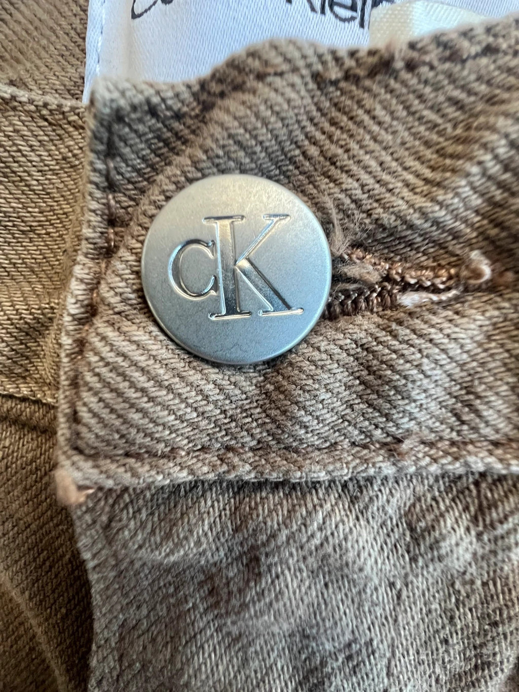Calvin Klein brown straight jeans high rise denim with vintage style and no tags.