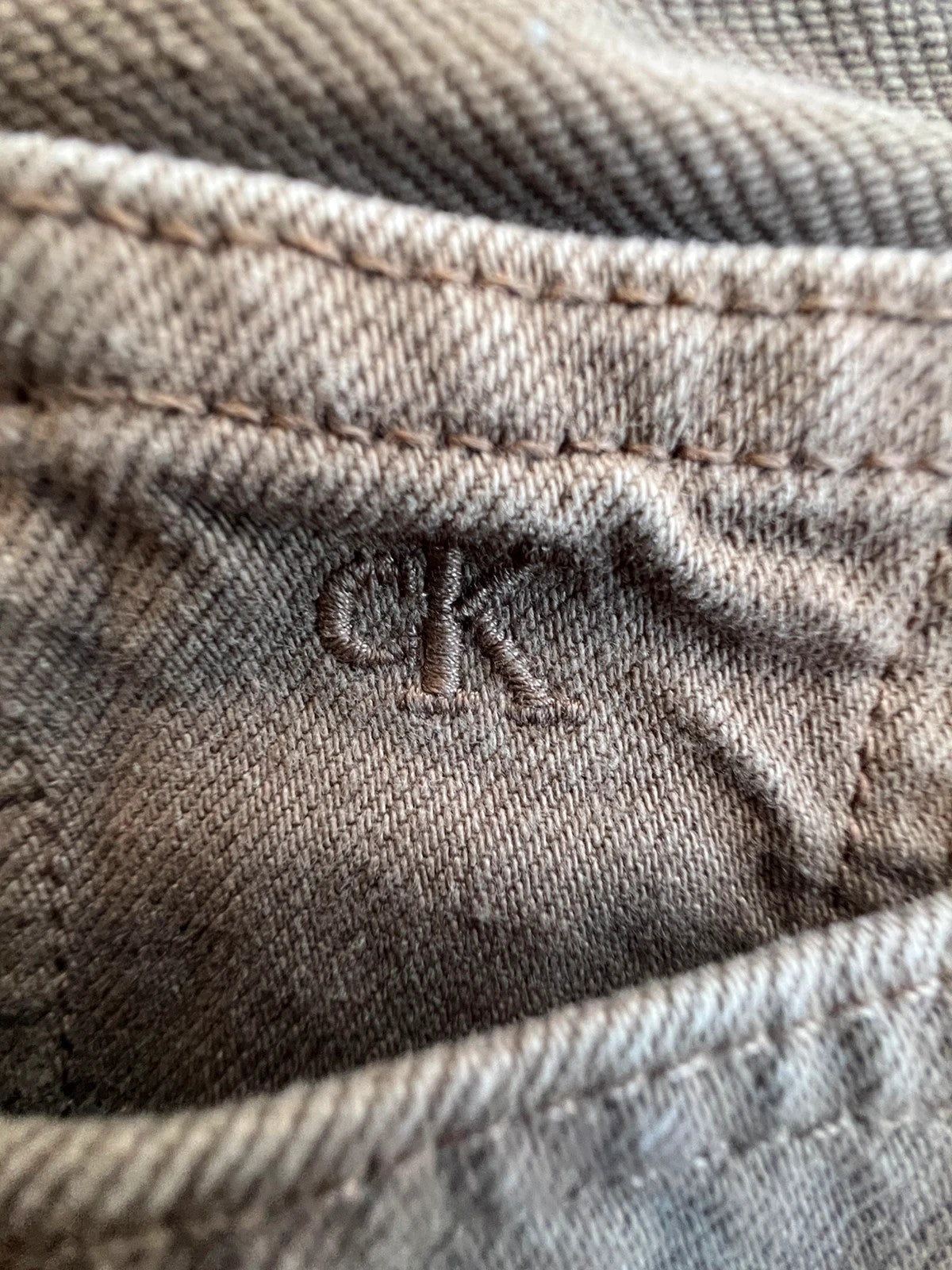 Calvin Klein brown straight jeans high rise denim with vintage style and no tags.