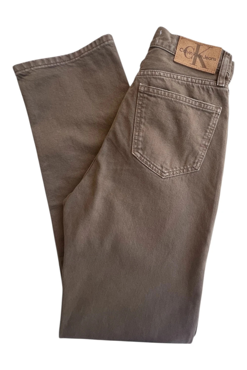 Calvin Klein brown straight jeans high rise denim with vintage style and no tags.