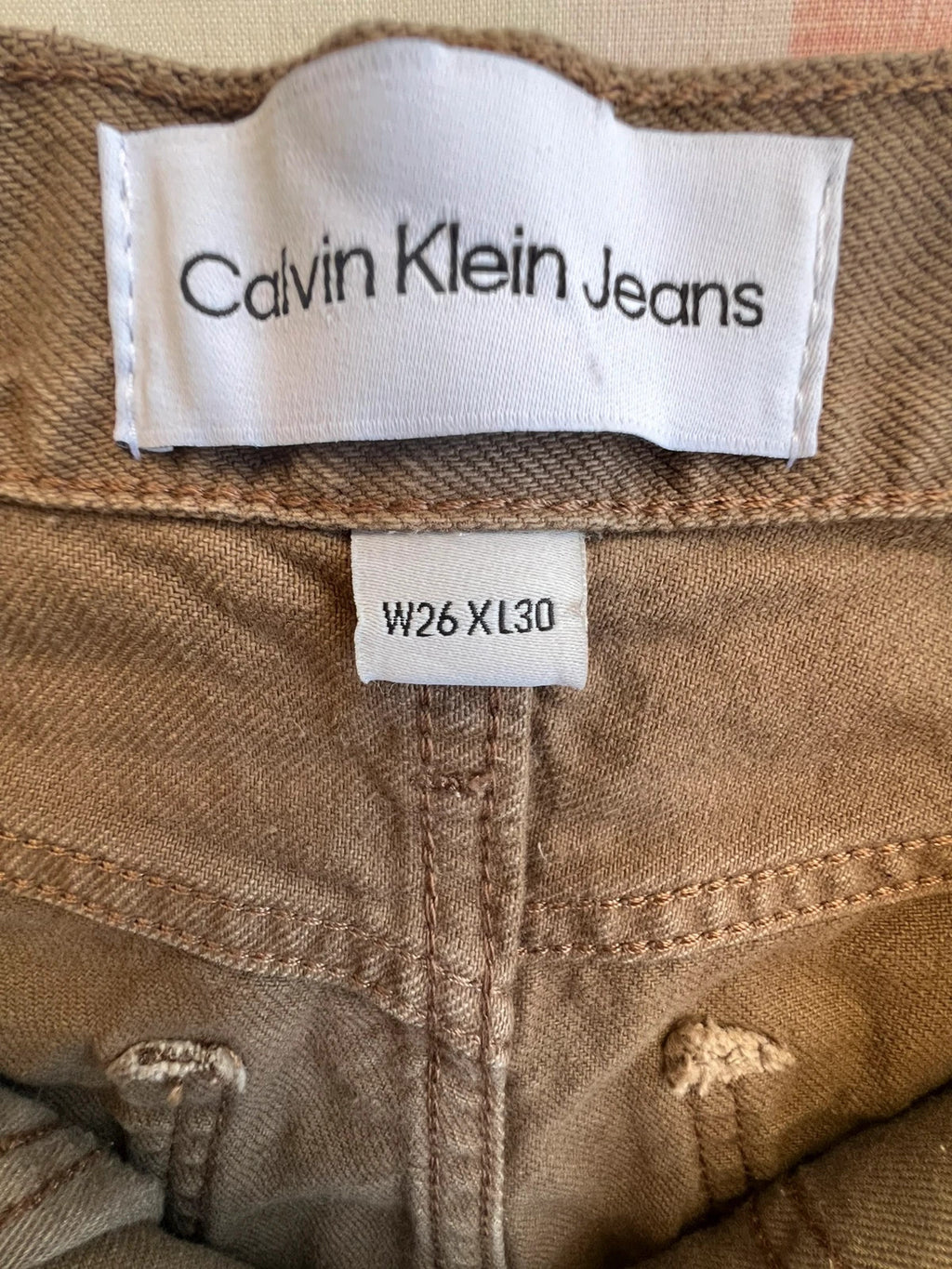 Calvin Klein brown straight jeans high rise denim with vintage style and no tags.