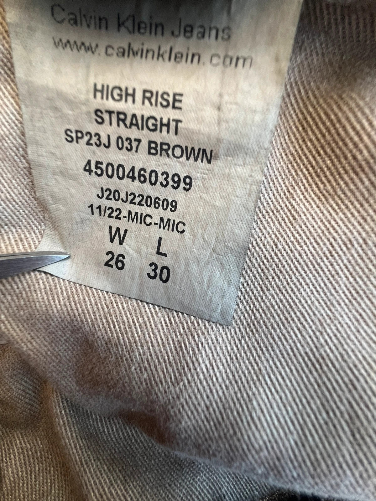 Calvin Klein brown straight jeans high rise denim with vintage style and no tags.