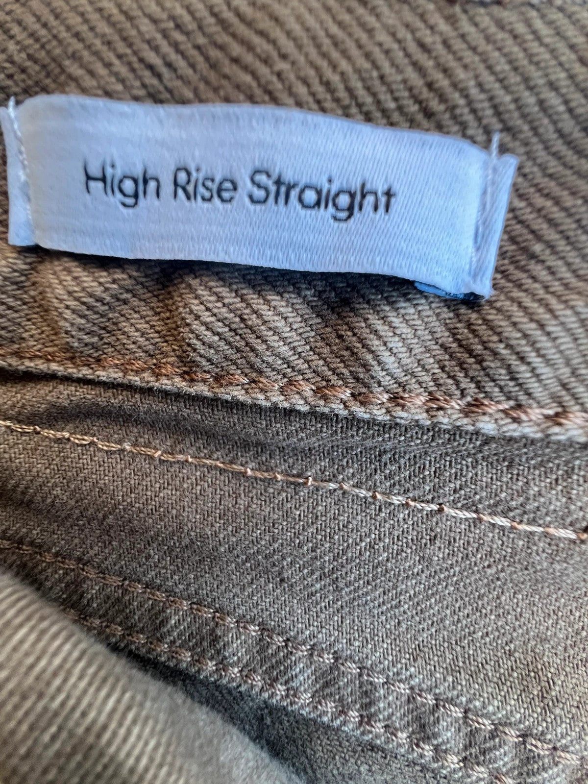 Calvin Klein brown straight jeans high rise denim with vintage style and no tags.