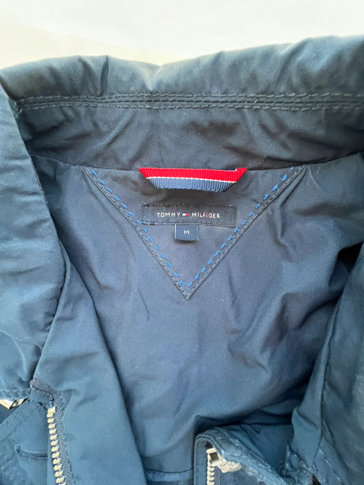 Tommy Hilfiger navy trench coat with premium zippers, buttons, and classic Old Money style.