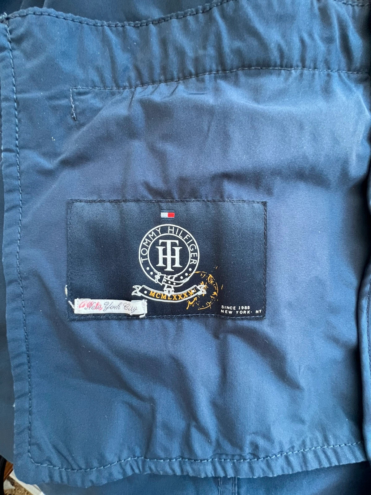 Tommy Hilfiger navy trench coat with premium zippers, buttons, and classic Old Money style.