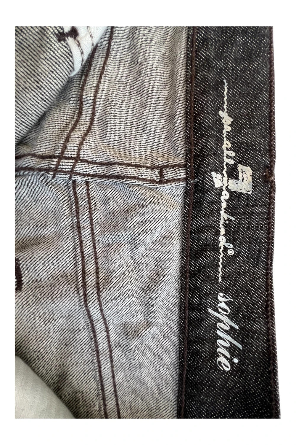 7 For All Mankind brown skinny jeans with premium denim and minimalistic design.