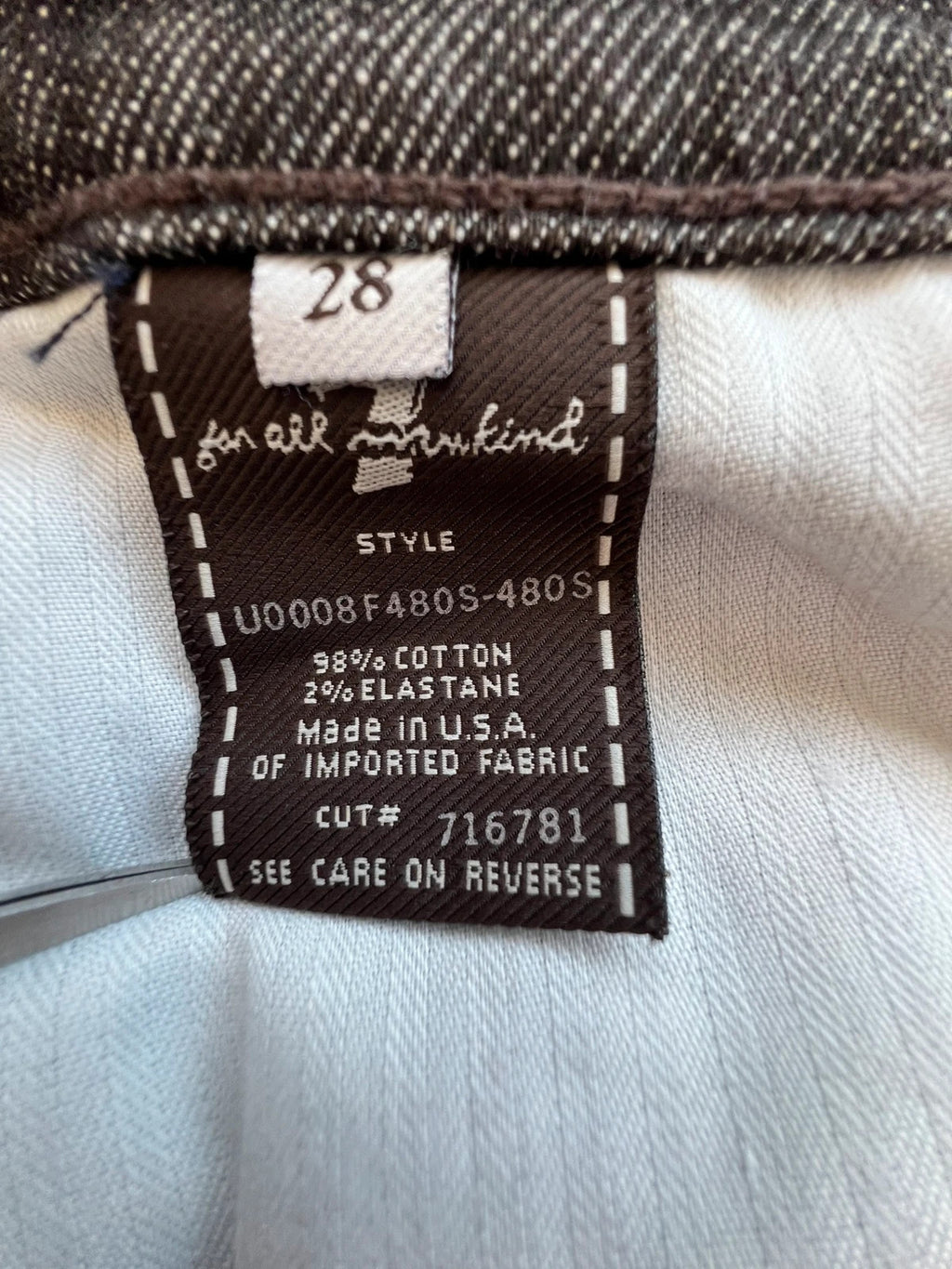 7 For All Mankind brown skinny jeans with premium denim and minimalistic design.