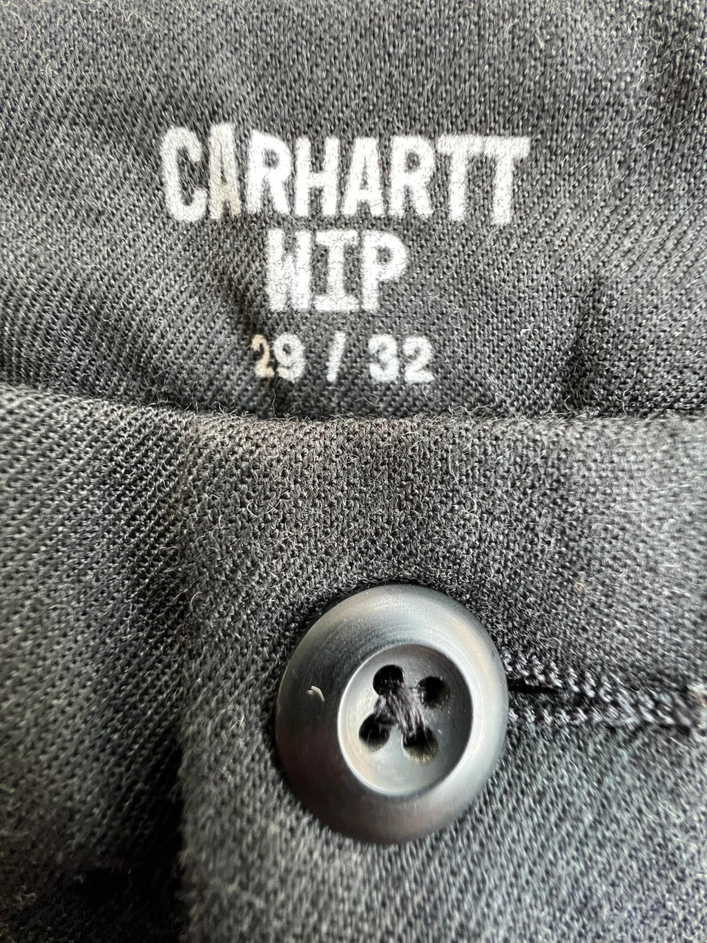 Carhartt grey chino trousers straight cut, durable fabric with subtle elastic stretch.