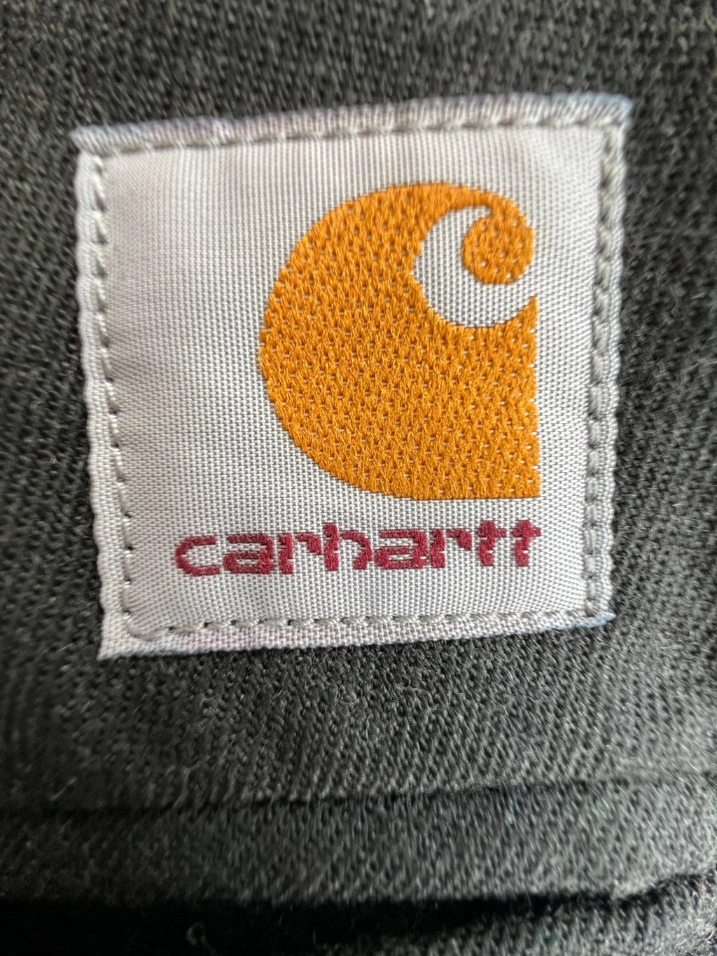 Carhartt grey chino trousers straight cut, durable fabric with subtle elastic stretch.