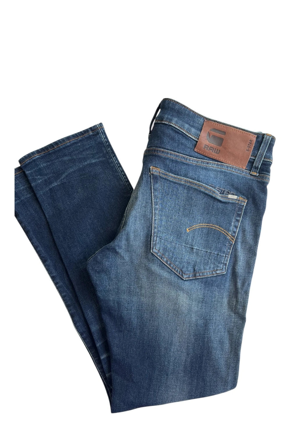 G-Star blue slim jeans 3301 with classic style and denim material.