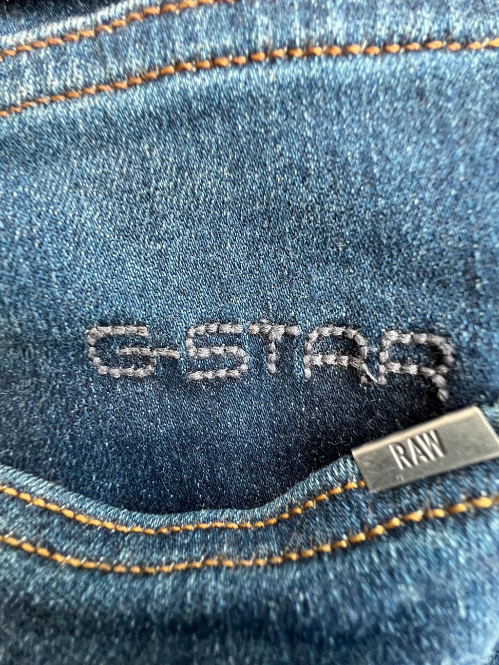 G-Star blue slim jeans 3301 with classic style and denim material.