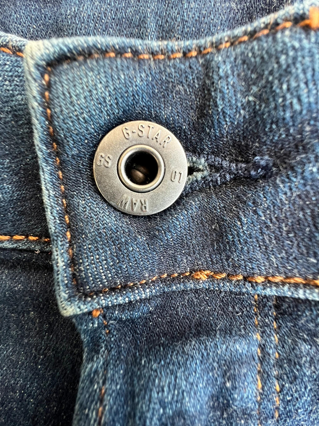G-Star blue slim jeans 3301 with classic style and denim material.