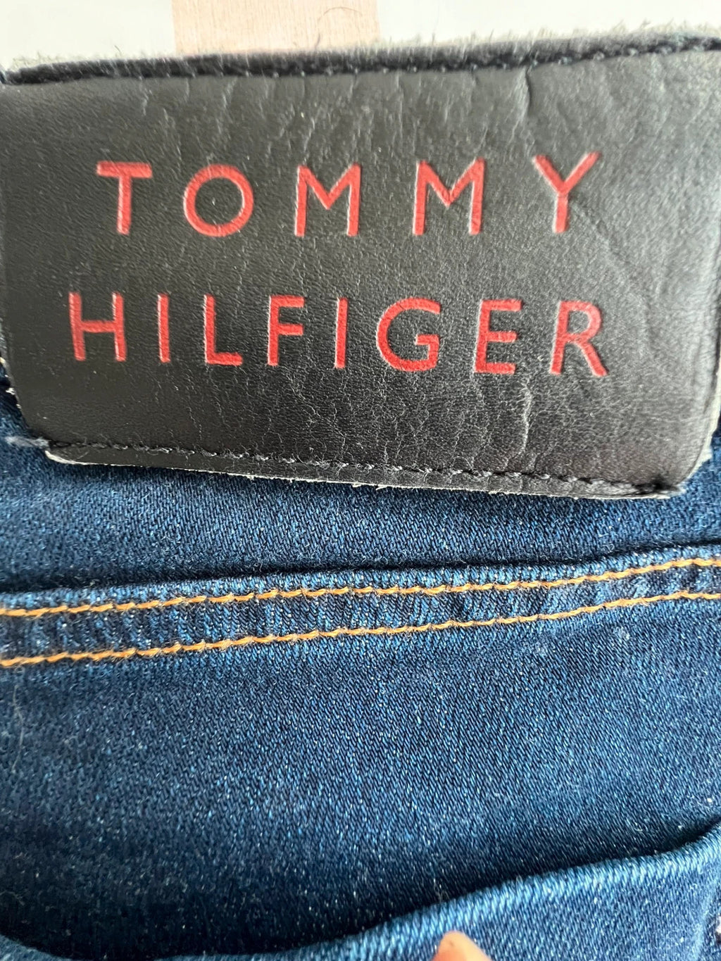 Tommy Hilfiger navy slim tapered jeans, Riverpoint model, elastic denim, casual style.