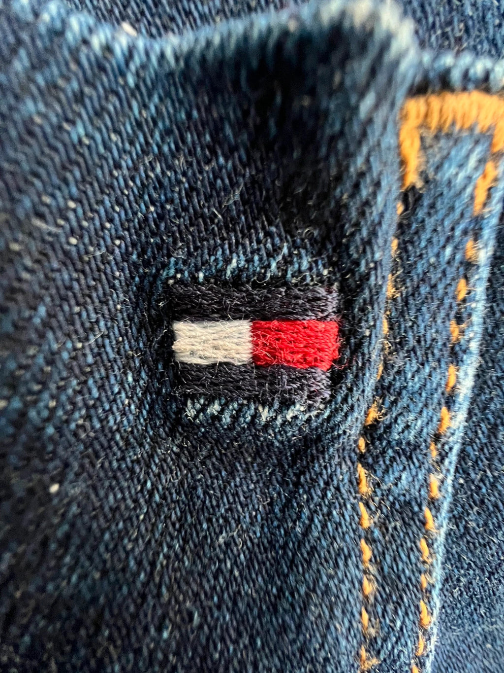 Tommy Hilfiger navy slim tapered jeans, Riverpoint model, elastic denim, casual style.