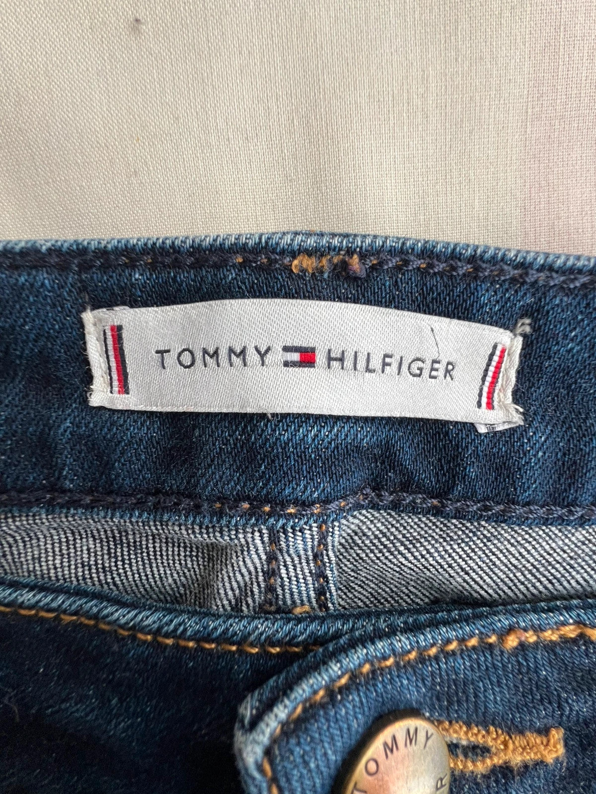 Tommy Hilfiger navy slim tapered jeans, Riverpoint model, elastic denim, casual style.