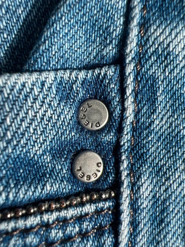Diesel blue bootcut jeans with vintage casual style and Y2K flair.
