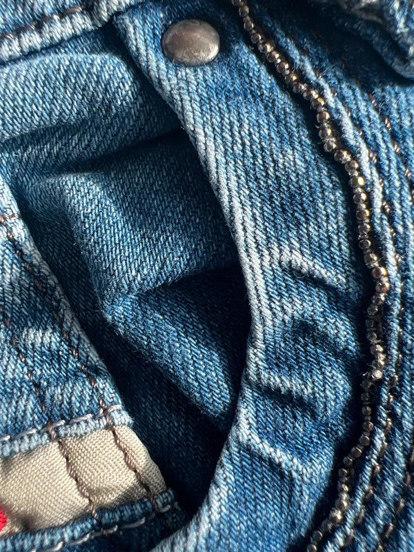 Diesel blue bootcut jeans with vintage casual style and Y2K flair.