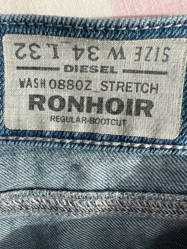 Diesel blue bootcut jeans with vintage casual style and Y2K flair.