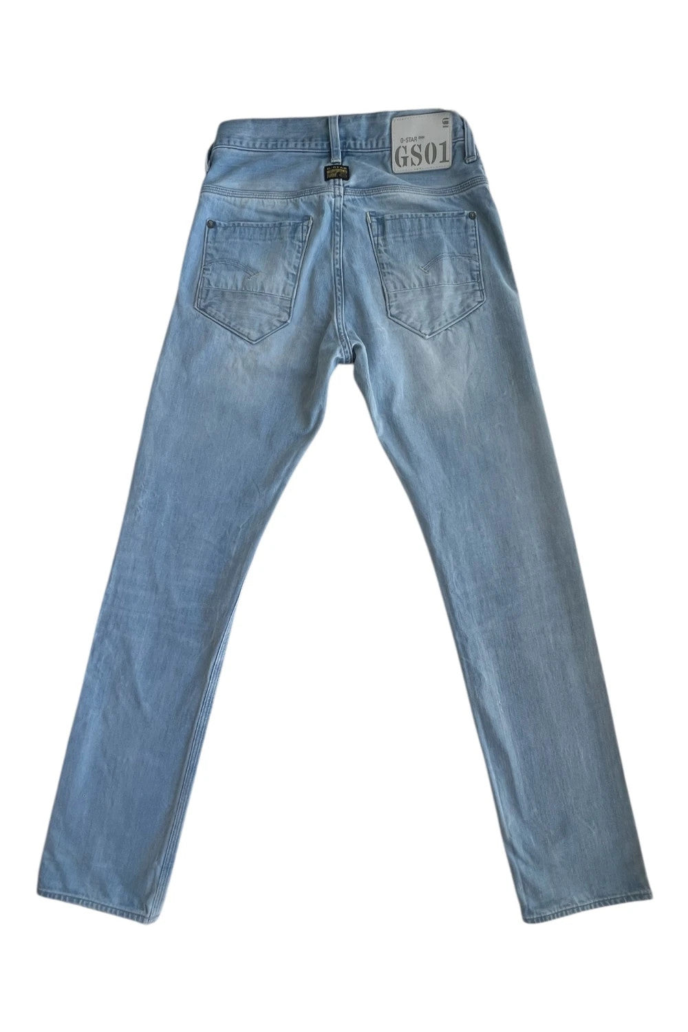 G-Star light blue straight jeans with subtle wear, Y2K style, and logo details.