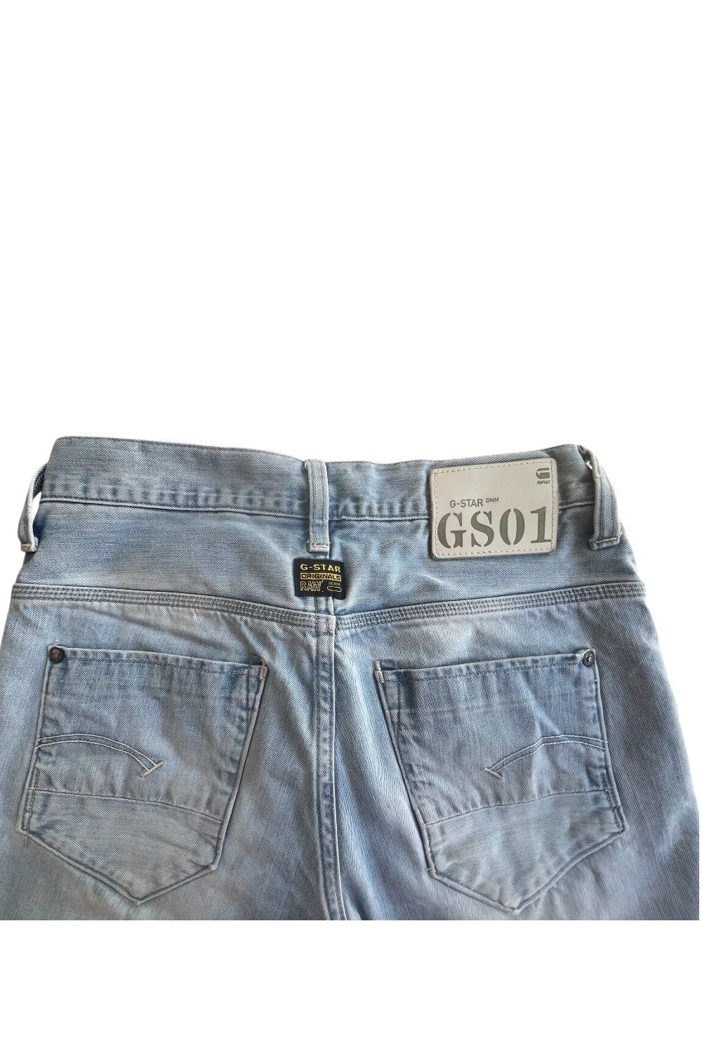 G-Star light blue straight jeans with subtle wear, Y2K style, and logo details.