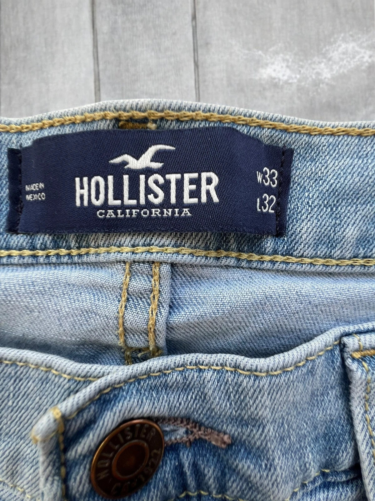 Hollister blue slim straight jeans with casual style and light denim wash.
