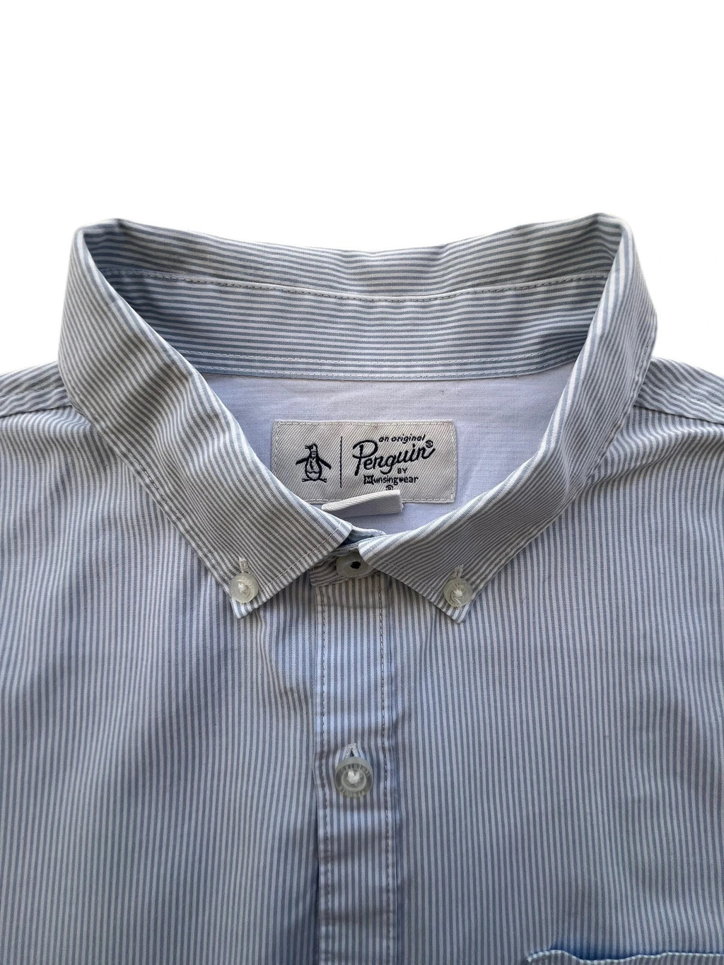 Penguin blue and white striped button down shirt with casual collar and subtle imperfections.