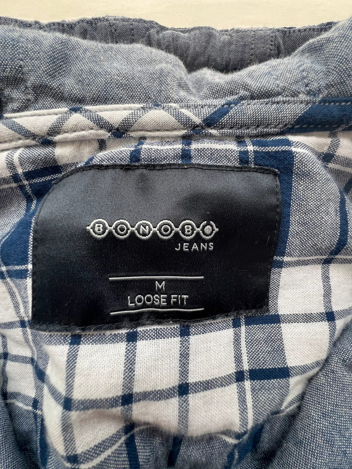 Bonobo navy and white checkered hoodie with hood, loose fit, new without tags.