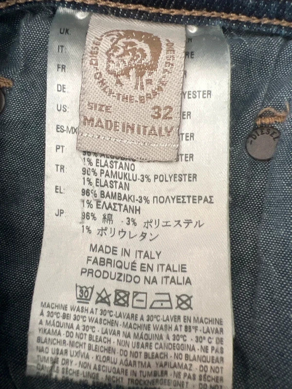 Diesel blue slim straight jeans with logo patch and classic denim texture.