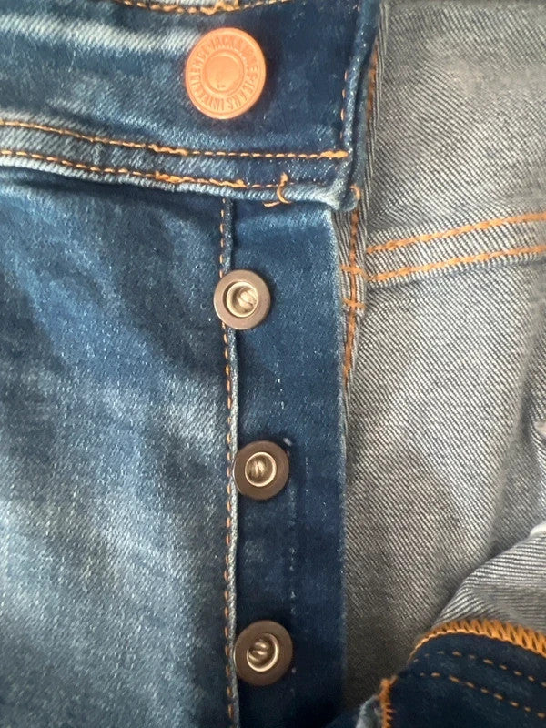 Jack & Jones blue straight jeans slim fit casual urban style with denim material.