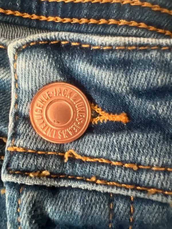 Jack & Jones blue straight jeans slim fit casual urban style with denim material.
