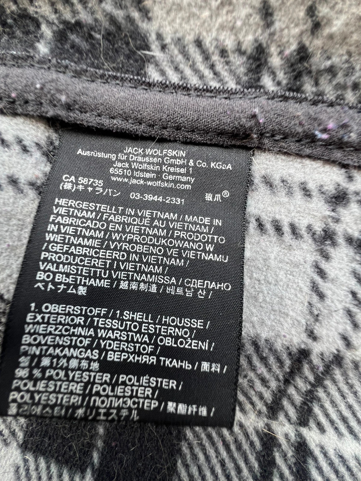 Jack Wolfskin grey fleece coat with hood, outdoor style, vintage, comfortable material.
