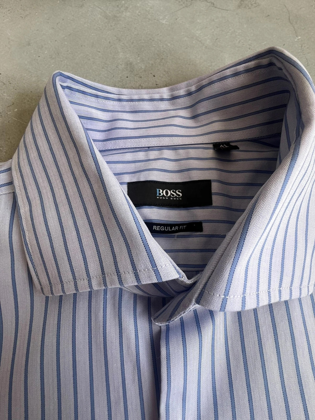 Hugo Boss blue striped formal shirt with cufflink buttons and regular fit.