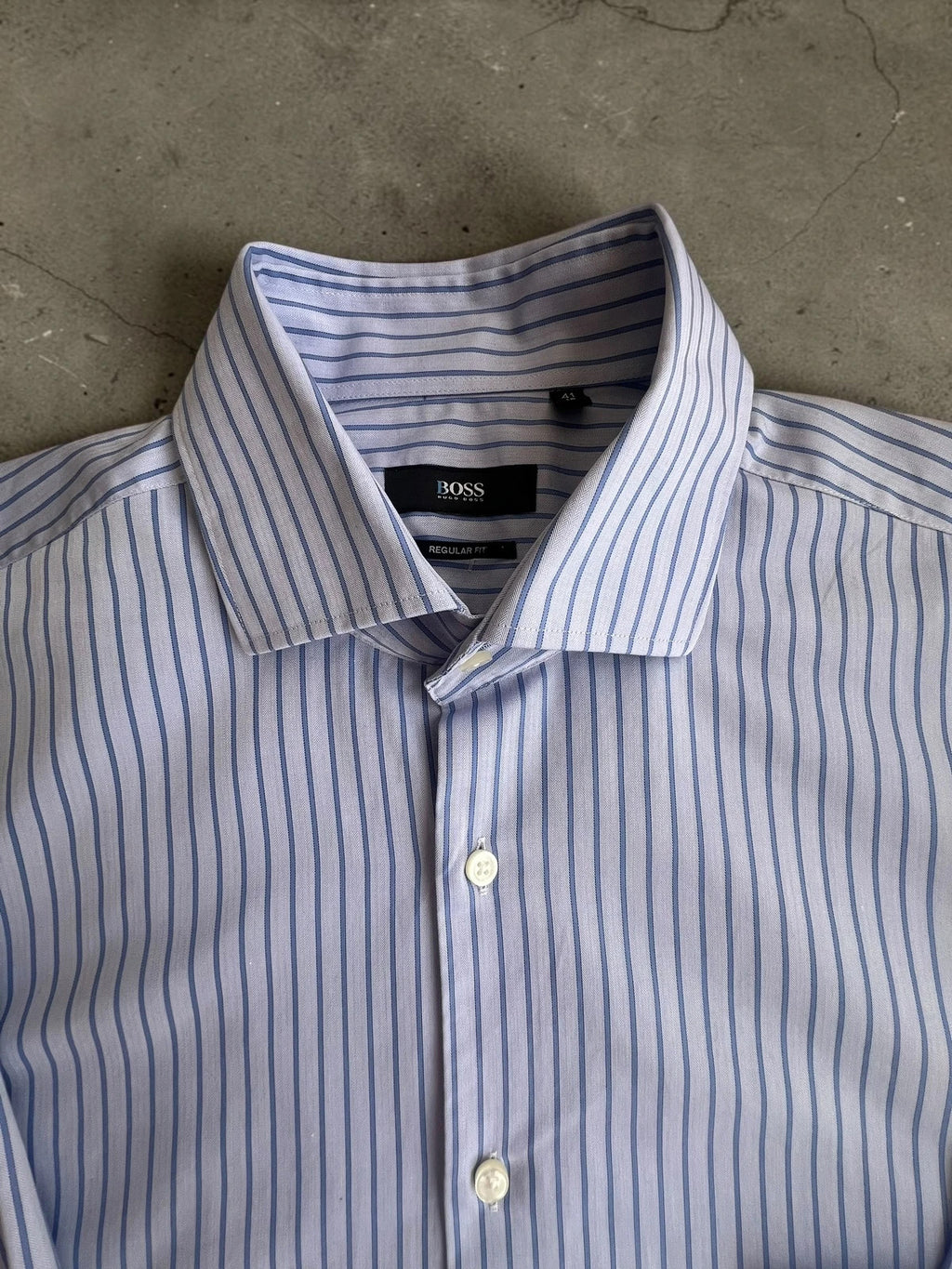 Hugo Boss blue striped formal shirt with cufflink buttons and regular fit.