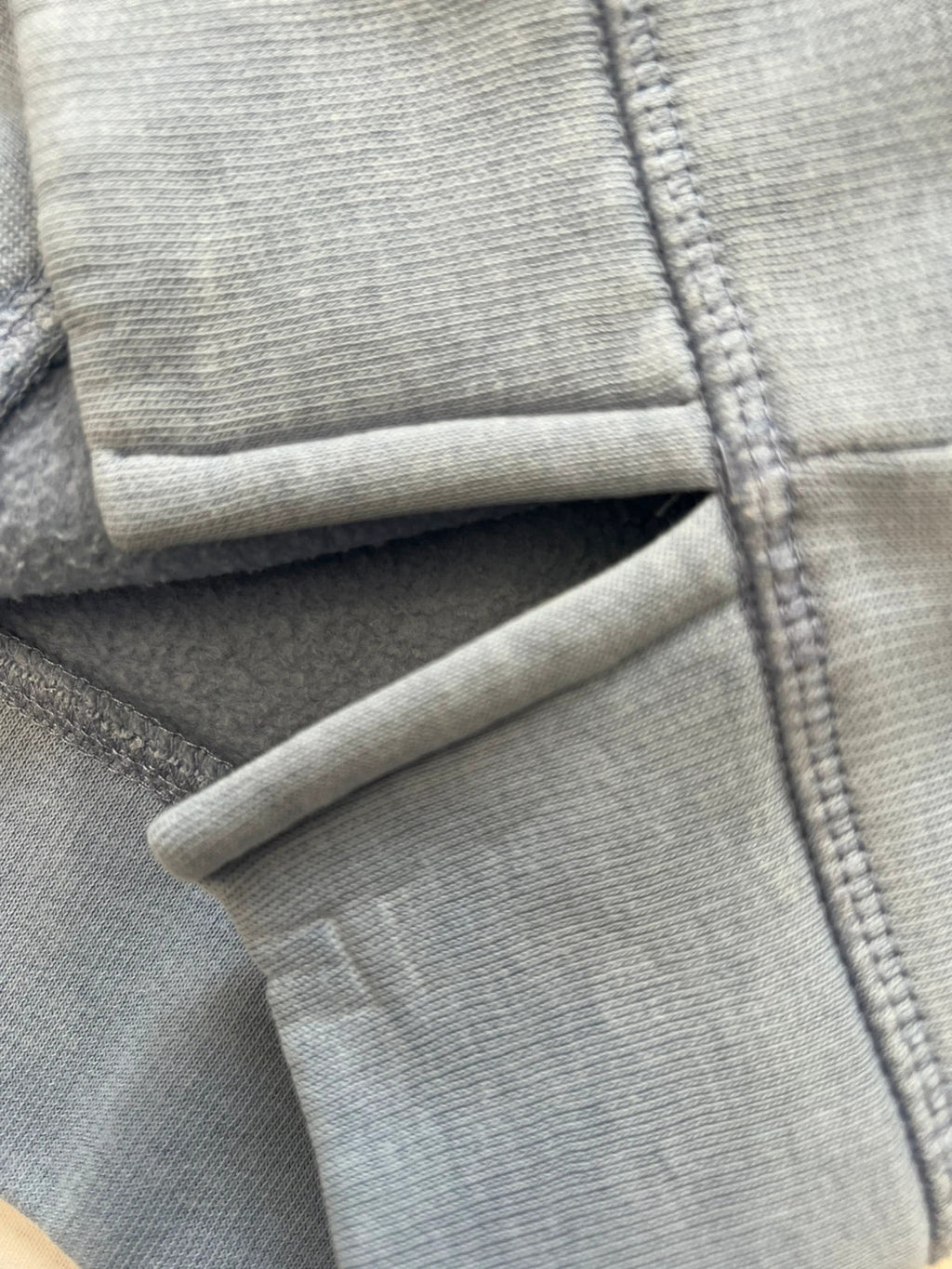 Tommy Hilfiger blue hoodie with embroidered logo and adjustable hood, soft interior.