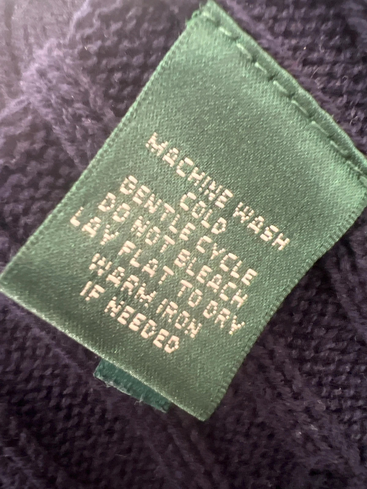 Ralph Lauren navy jumper cable knit with embroidered RL logo and V-neck.
