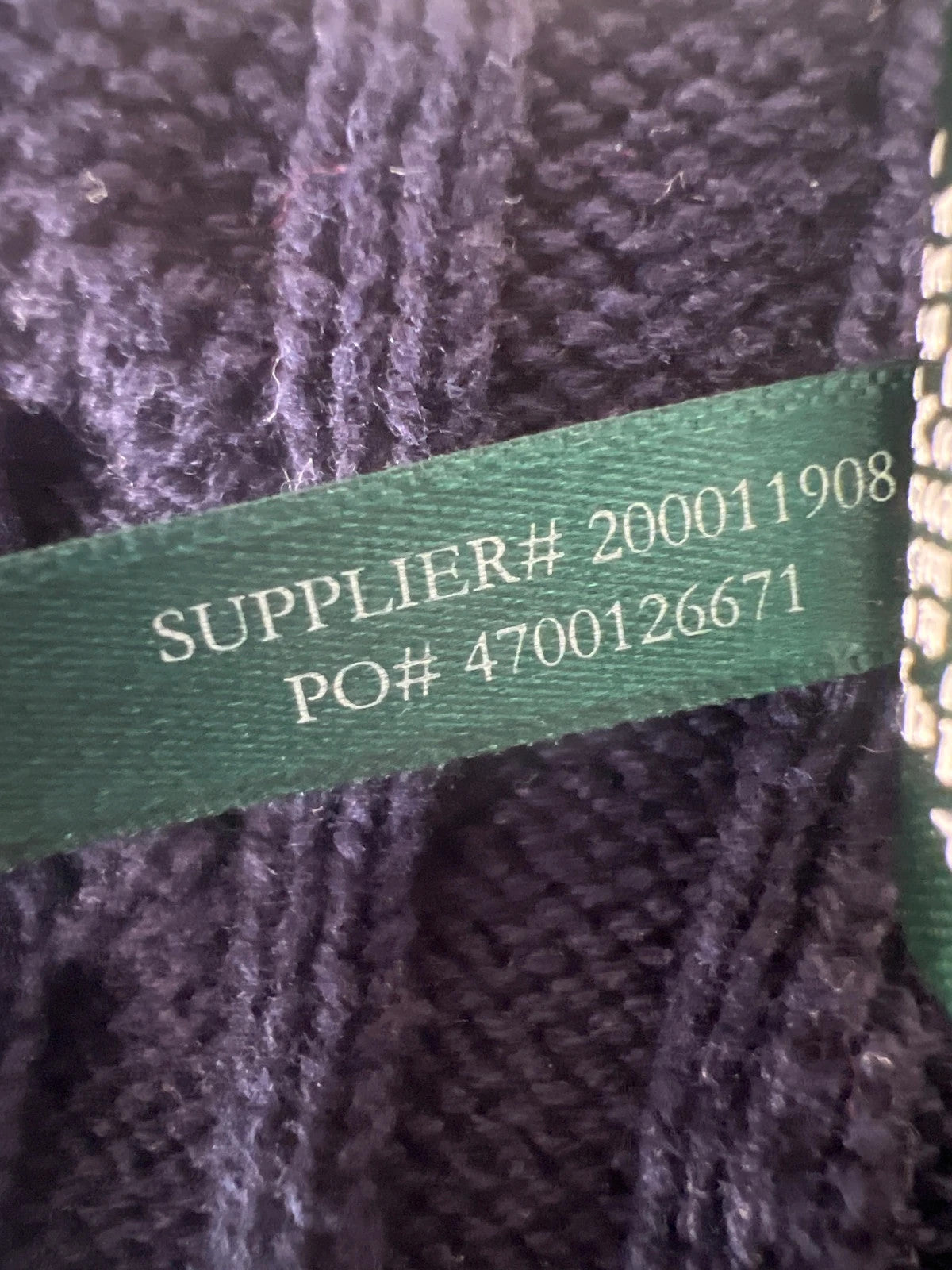 Ralph Lauren navy jumper cable knit with embroidered RL logo and V-neck.