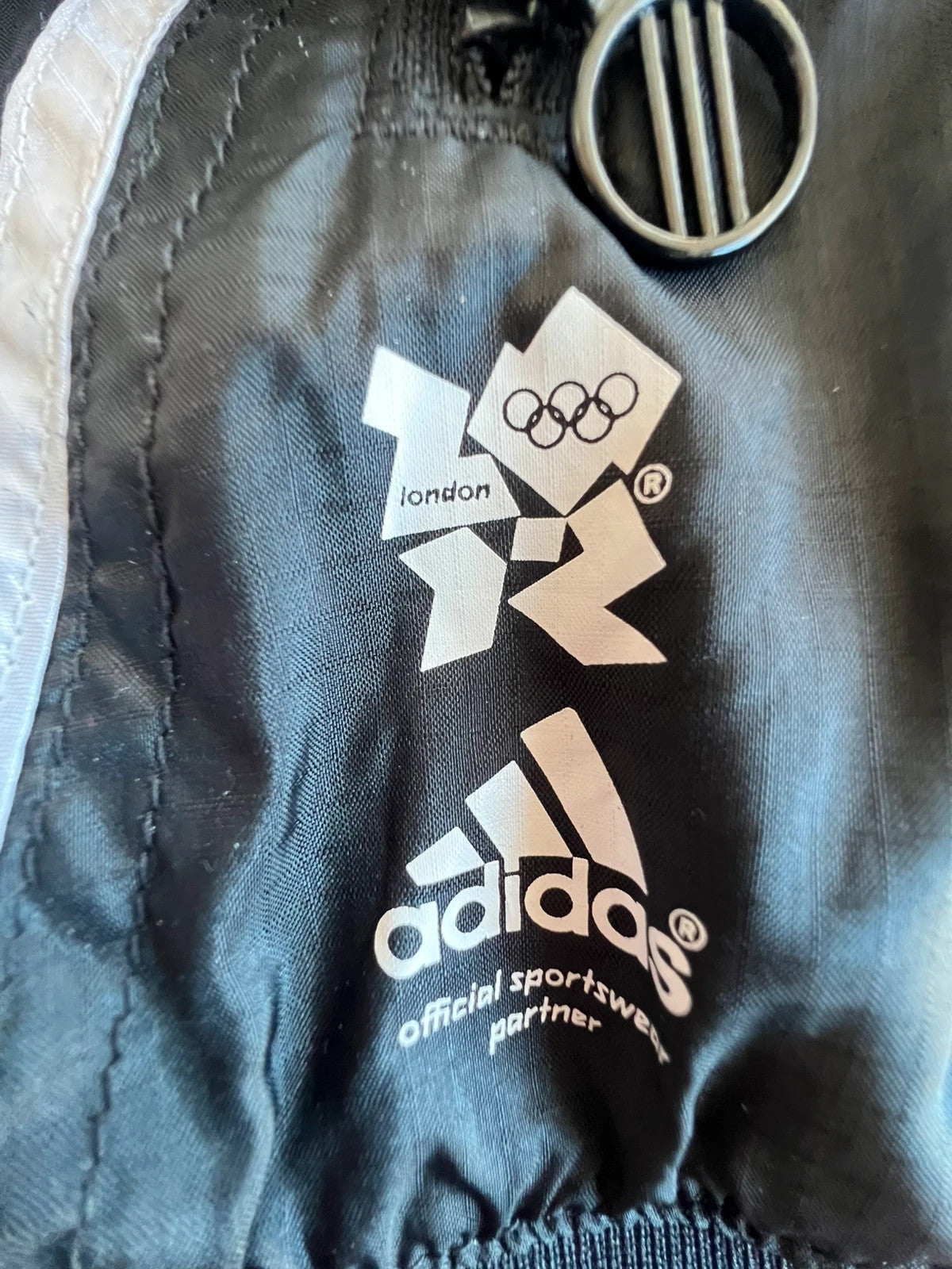 Adidas black bomber jacket reversible London 2012 logo and Olympic detail.